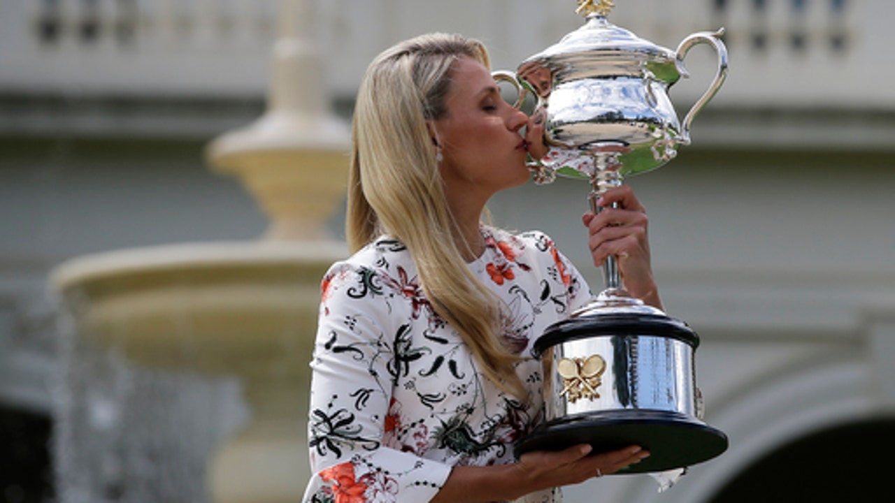 The Latest: Vesnina, Soares win Aussie mixed doubles title
